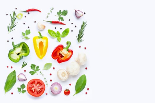 Various fresh vegetables and herbs on white background. Healthy eating concept