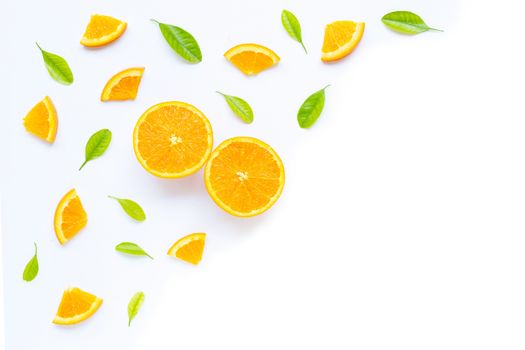 High vitamin C, Juicy and sweet. Fresh orange fruit with green leaves  on white background