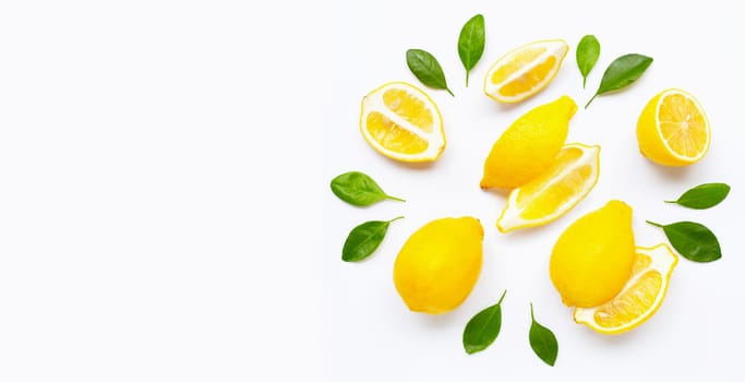 Fresh lemon and  slices  with leaves isolated on white background.
