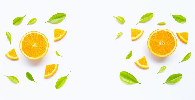 High vitamin C, Juicy and sweet. Fresh orange fruit with green leaves  on white background