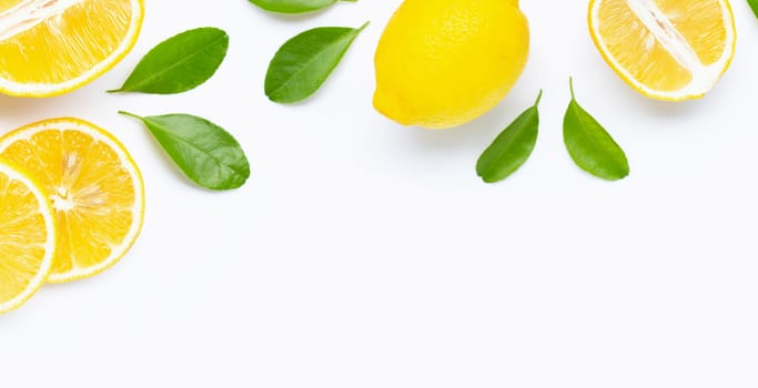 Frame made of fresh lemon and  slices with leaves isolated on white background.