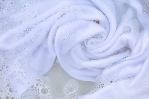 Soak a cloth before washing, white cloth