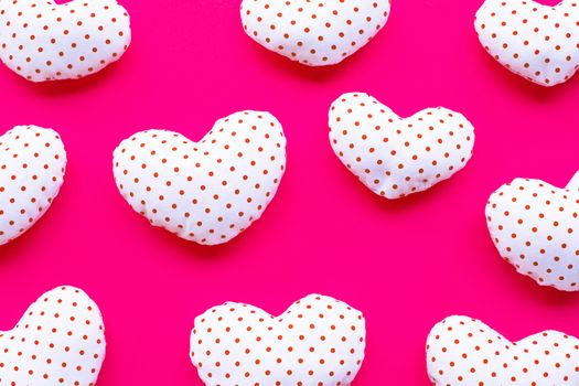 Valentine's hearts on red background, Top view
