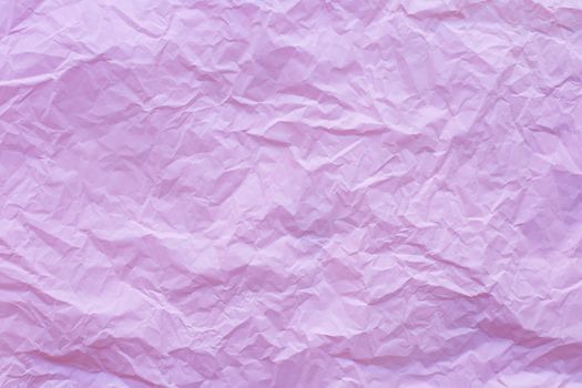 Pink crumpled recycle paper background