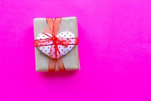 Valentine's day with gift box  on pink background. Top view