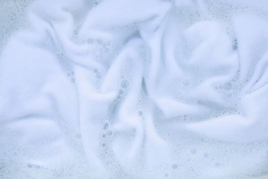 Soak a cloth before washing, white cloth