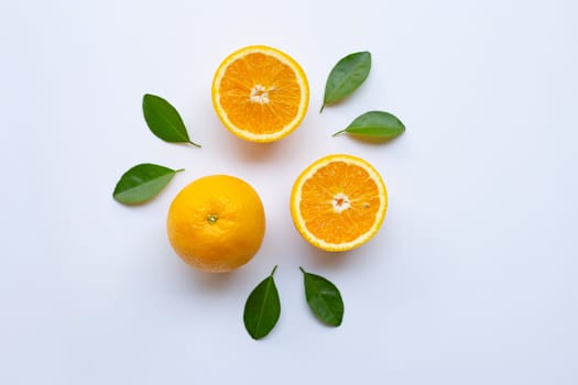 Fresh orange  with green leaves on white background. Top view