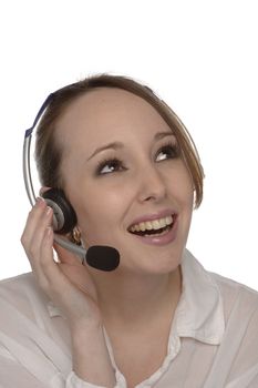 Young female customer services operator taking a call