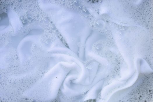 Soak a cloth before washing, white cloth