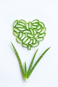 Aloe vera with slices heart shaped on white background