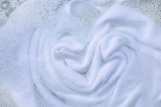 Soak a cloth before washing, white cloth