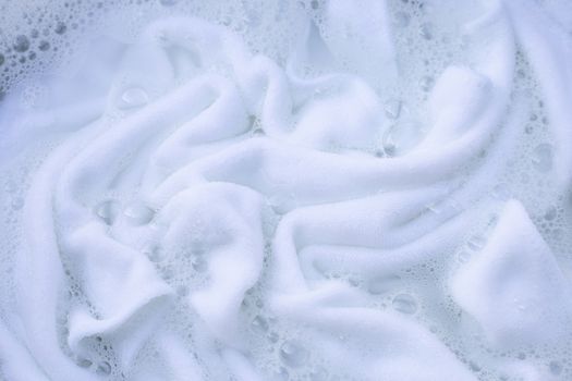 Soak a cloth before washing, white cloth