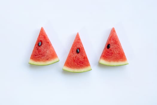 Sweet watermelon slices on white background