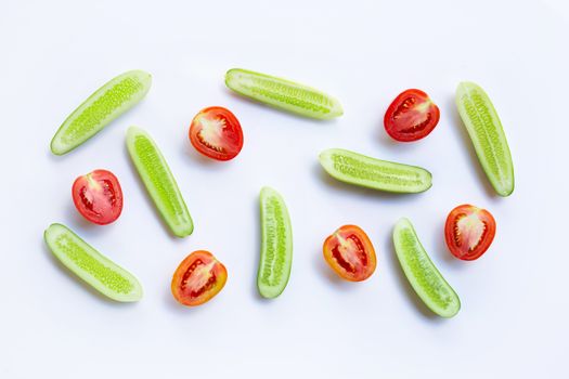 Cucumber, Tomato, Natural ingredients for homemade skin care on white.