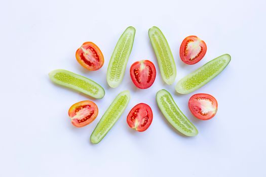 Tomatoes, Cucumbers, Natural ingredients for homemade skin care on white.