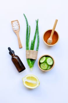 Aloe vera, lemon, cucumber, salt, honey. Natural ingredients for homemade skin care on white