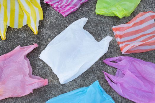 Plastic garbage bags on cement floor. Top view