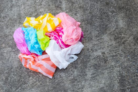 Plastic bags waste on  cement floor background