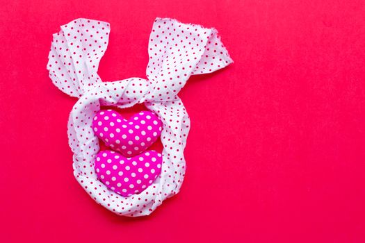 Valentine's hearts on red background, Top view with copy space