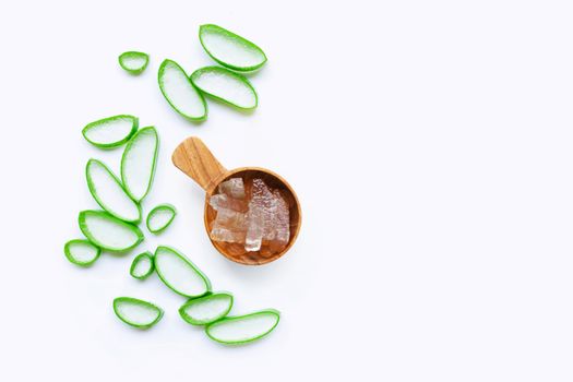 Aloe vera slices and gel on white background. Copy space