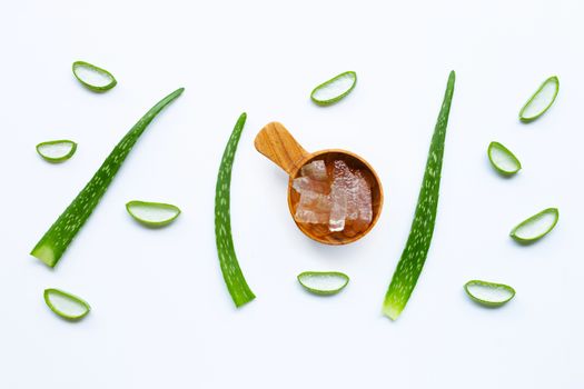 Aloe vera slices on white background.