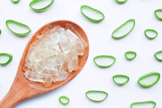 Aloe vera slices on white background.