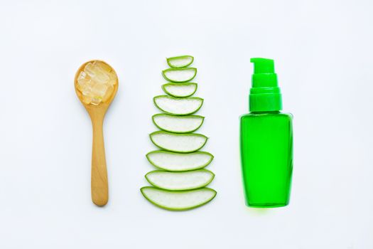 Bottle of products for spa or skin care cosmetic aloe vera gel and Aloe vera slices isolated on white background
