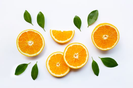Fresh orange citrus fruit with leaves on white background