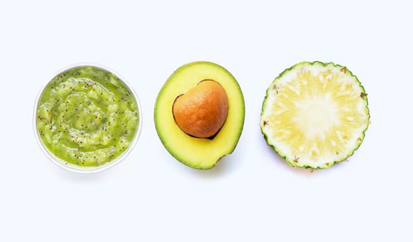 Kiwi, avocado and pineapple. Fresh fruits and natural  ingredients for homemade skin care and scrub on white background.
