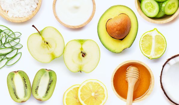 Natural ingredients for homemade skin care on white