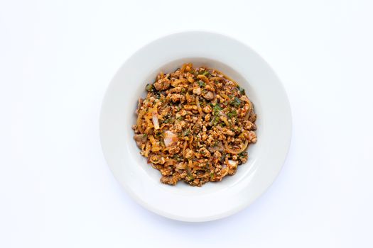 Spicy mince pork salad on white bakcground. Copy space