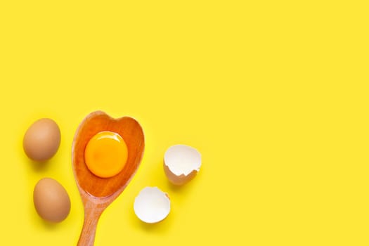 Eggs on yellow background. Top view
