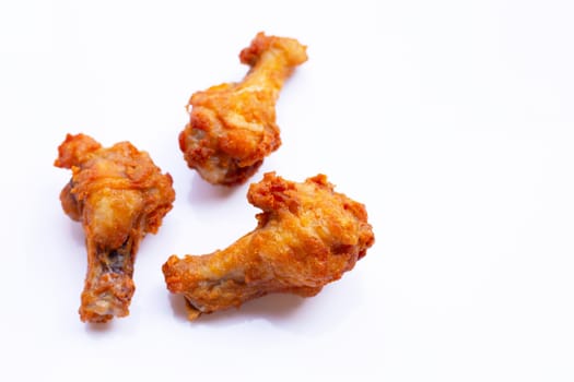 Fried chicken on white background. Copy space