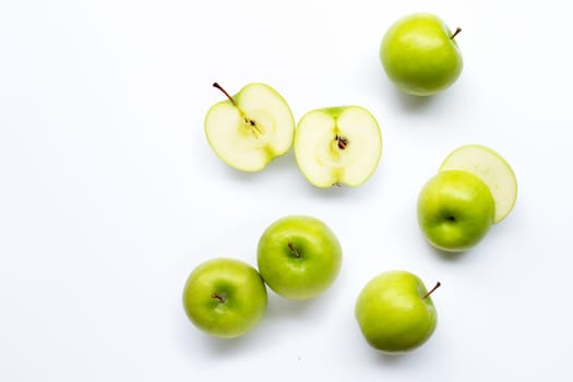 Green apples on white background. Copy space