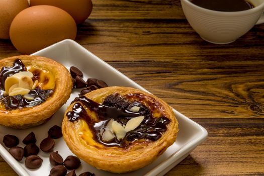 Traditional Portuguese egg tart to be eaten with coffee.