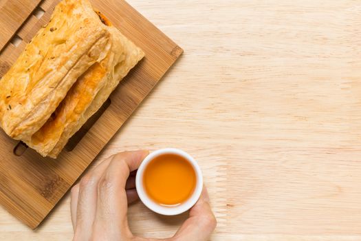 Freshly made puff pastry pie for tea break.