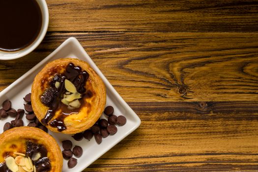 Traditional Portuguese egg tart to be eaten with coffee.