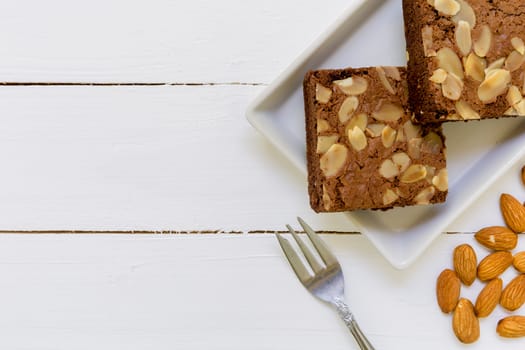 Chocolate almond brownie for tea or coffee break.