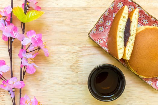 Dorayaki or Japanese pancake filled with red bean paste.