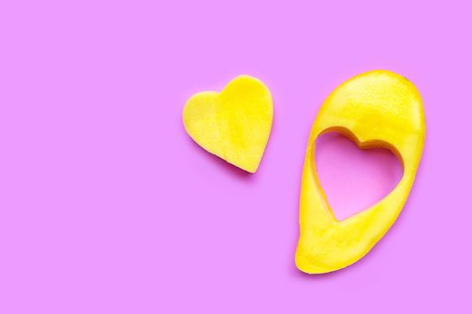 Tropical fruit, Mango  on pink background. Copy space