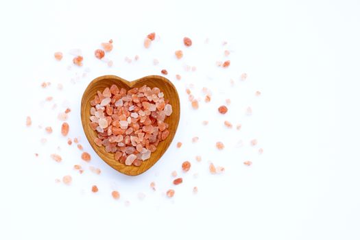 Pink himalayan salt on with background. Copy space