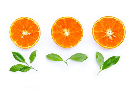 Orange fruit with leaves isolated on white background. 