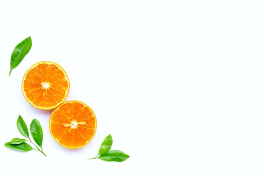 High vitamin C, Juicy orange fruit with leaves on white background. Copy space