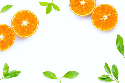 High vitamin C, Juicy orange fruit with leaves on white background. Copy space
