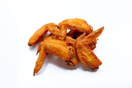 Fried chicken wings on white background.  Copy space