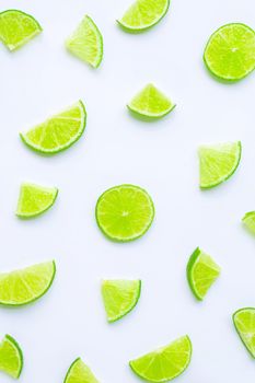 Fresh lime slices on white background.