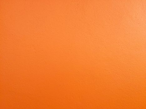 Orange concrete texture background. Copy space