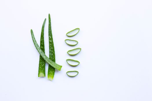 Aloe vera leaves with slices on white background. copy space