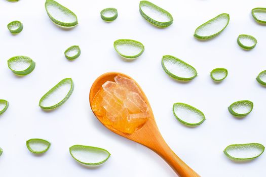 Aloe vera slices on white background.
