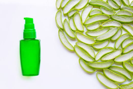 Bottle of products for spa or skin care cosmetic aloe vera gel and Aloe vera slices isolated on white background